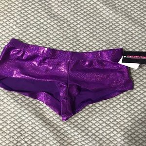 Rave booty shorts. NEW